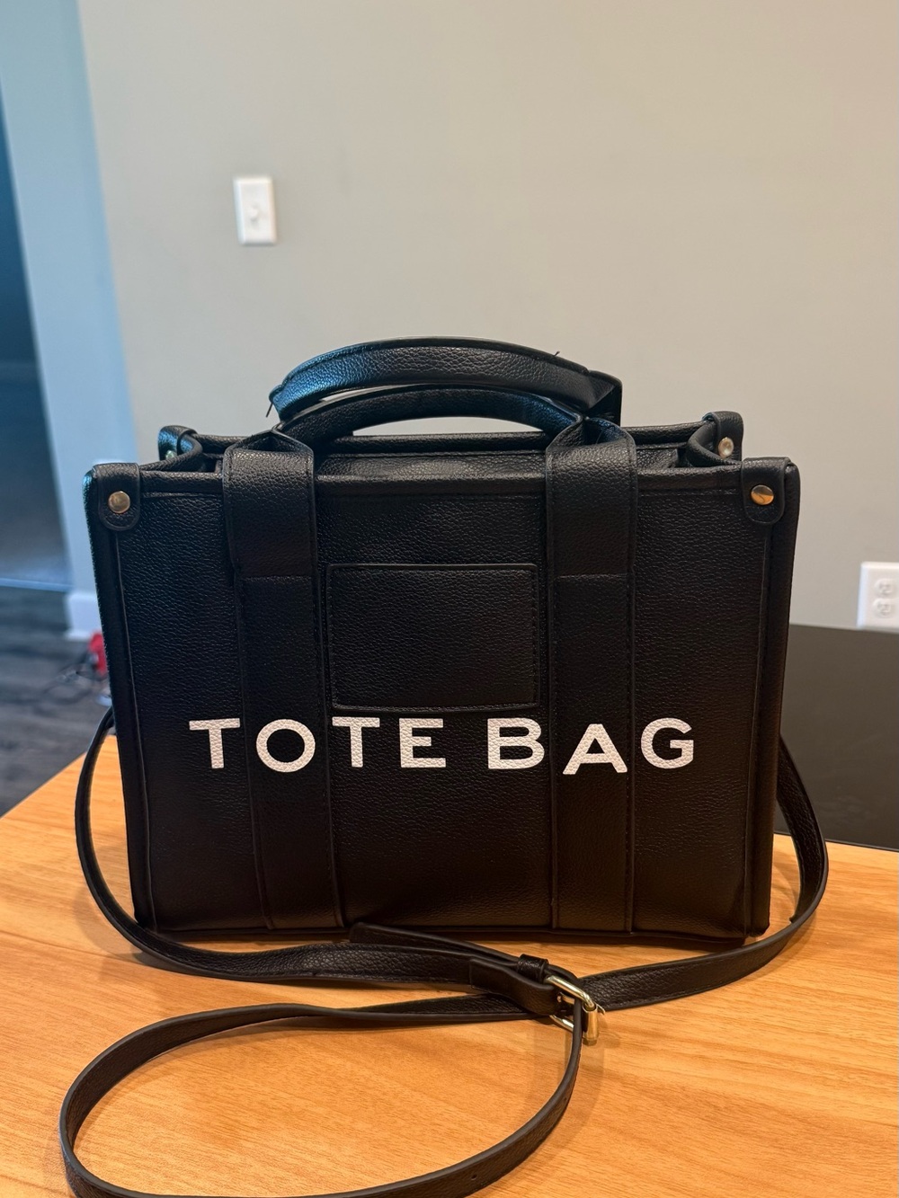 Source Unknown Black Crossbody Tote Bag with White Lettering